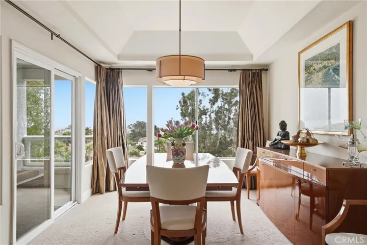 To The Left Of The Dining Room Is Another Sliding Glass Door To The Balcony