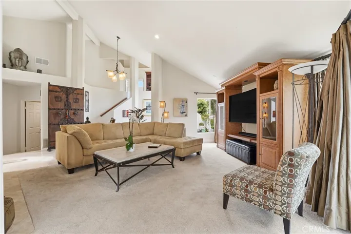 Another Feature Of The Living Room Is The Vaulted Ceilings