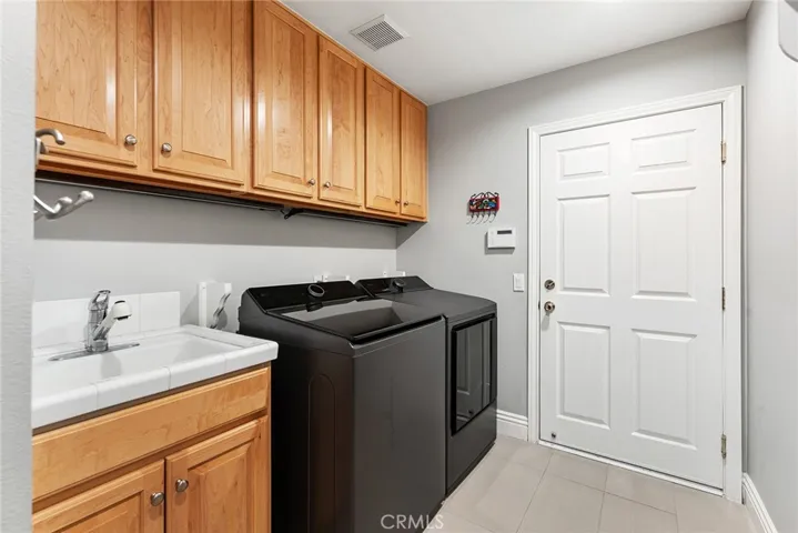 Downstairs Laundry with Direct Garage Access