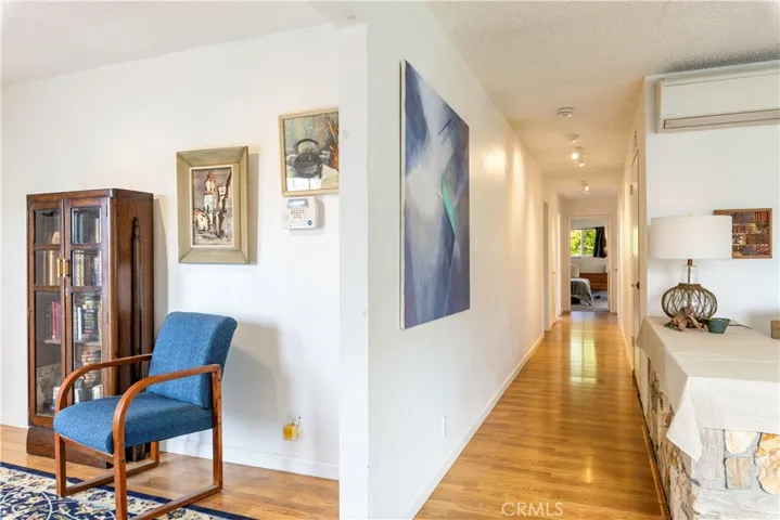Near front entrance with hallway and entrance to living room