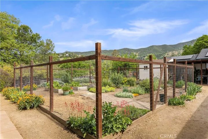 Fenced vegetable garden area.