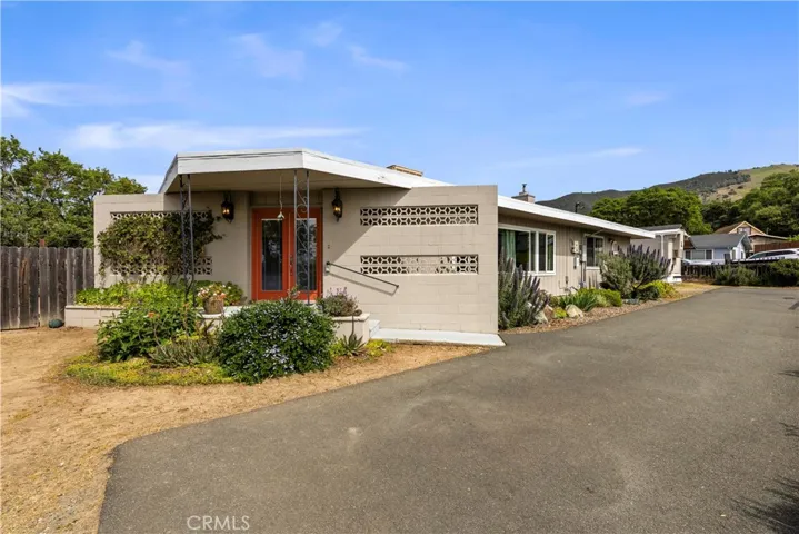 Front door and paved drive way.