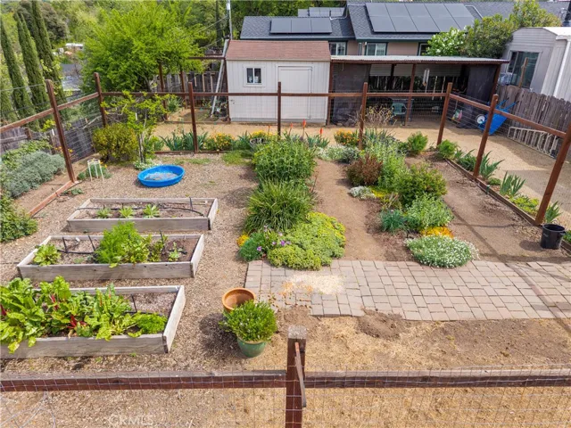 Fenced vegetable garden area.
