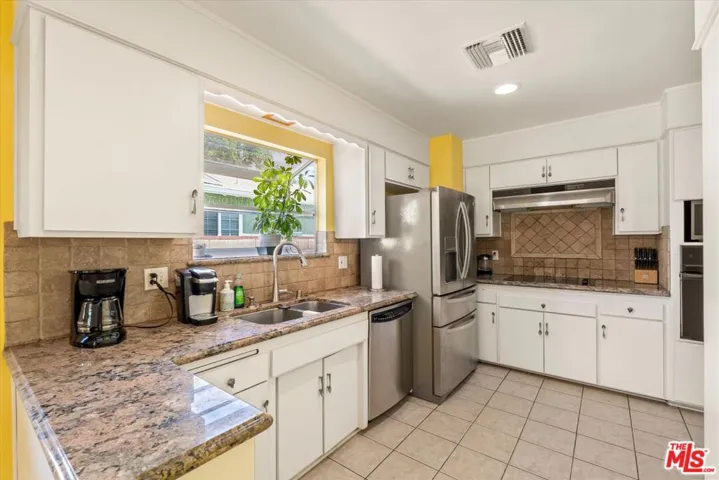 9313 Hayvenhurst Avenue, North Hills, California 91343