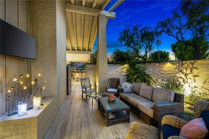 Cozy area on side yard with TV
