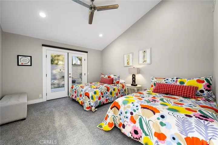 Guest Bedroom with french doors to side yard