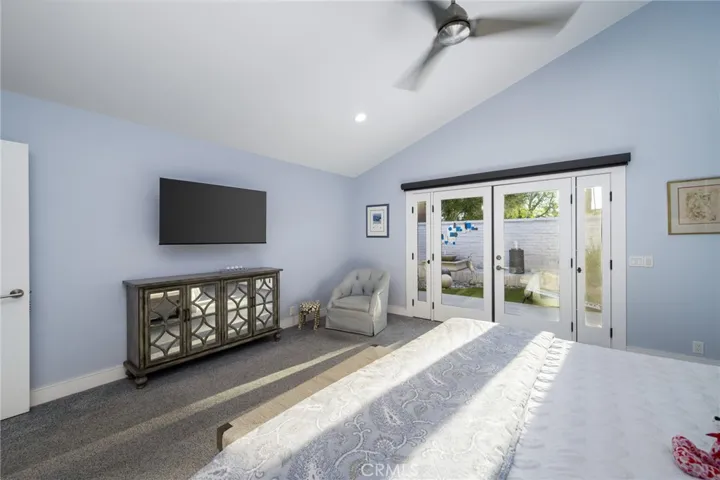 Primary w/french doors to side yard