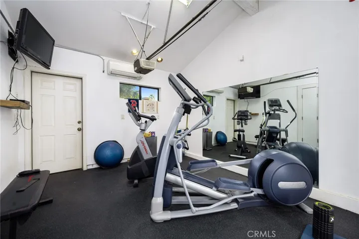 Golf cart garage used as gym, direct entry to Primary BA