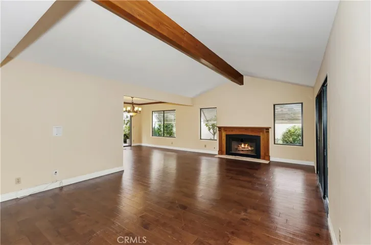 Living room with beamed ceiling