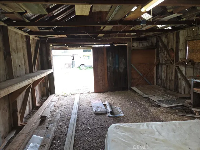 Reverse view inside one car garage.
