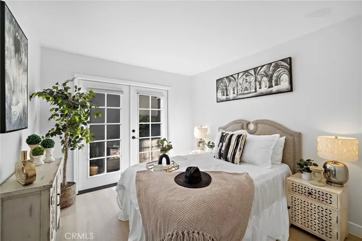 Main level bedroom with private entrance and adjacent to full bathroom with shower. Could be a private guest suite.