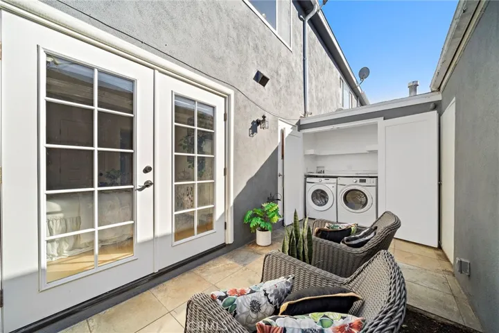 Laundry closet located in patio