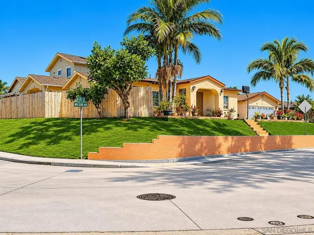 2306 Modesto Street, 4 Bedroom, 3 Baths Main House enhanced with AI adding grass to the left side of the photo