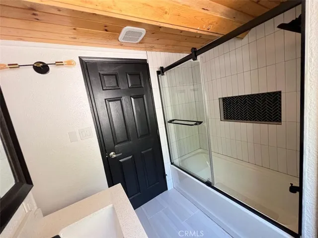 View of the tub shower combo