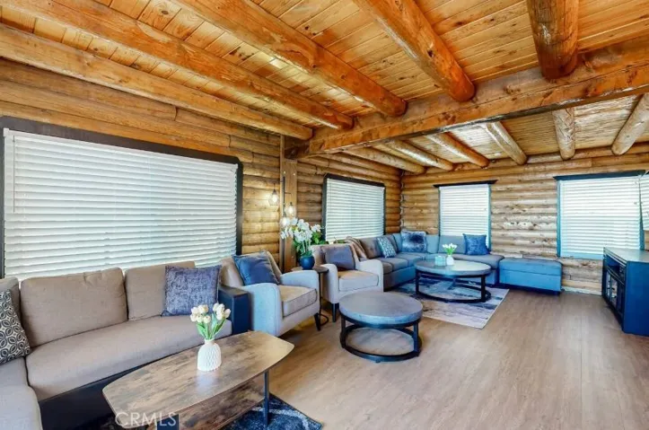Spacious living room with large windows