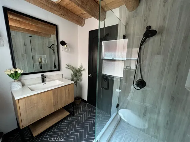 This is the main level bathroom with shower