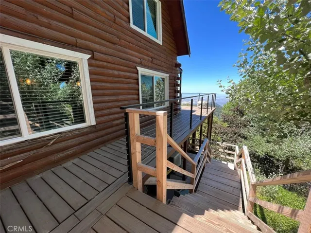 This is the side of the property with another set of stairs going down to the bottom unit