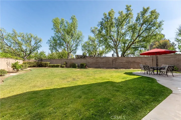 THIS YARD IS PERFECT FOR FAMILY FUN. ADD A FEW TALL TREES FOR MORE PRIVACY AND ENJOY!