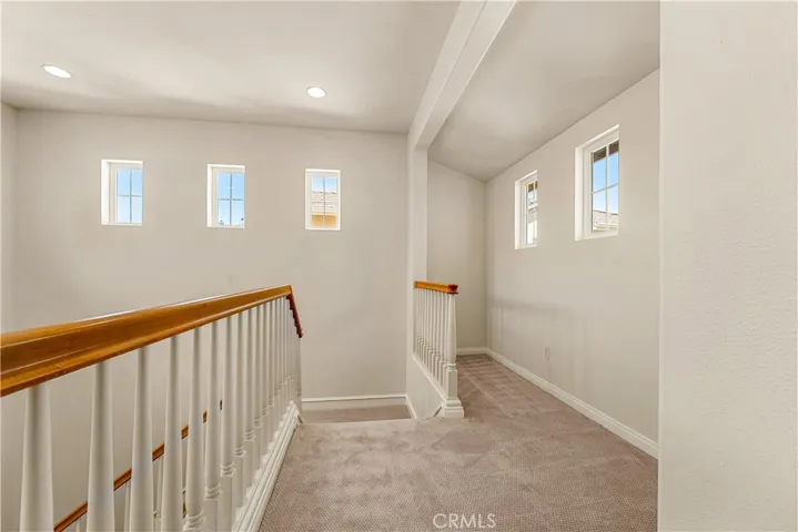 BRAND NEW CUSTOM PAINT AND UPSTAIRS COZY CARPET. Model showed a bookcase in this area or reading corner.