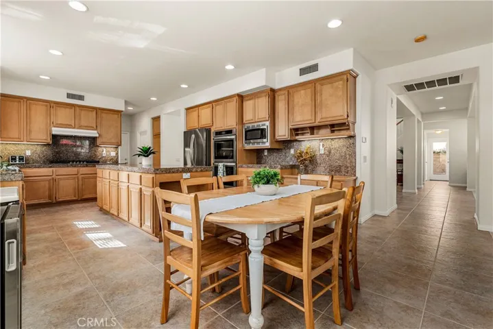 VERY FUNCTIONAL AND SPACIOUS KITCHEN WITH BREAKFAST NOOK AND MASSIVE ISLAND!