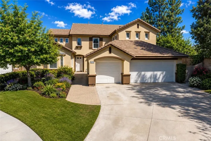 Nestled at the end of a cul-de-sac w/expansive driveway and endless possibilities!