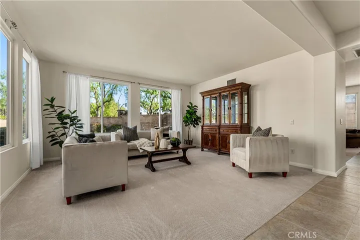 GORGEOUS AND VERY SPACIOUS FORMAL LIVING ROOM WITH TONS OF NATURAL LIGHT