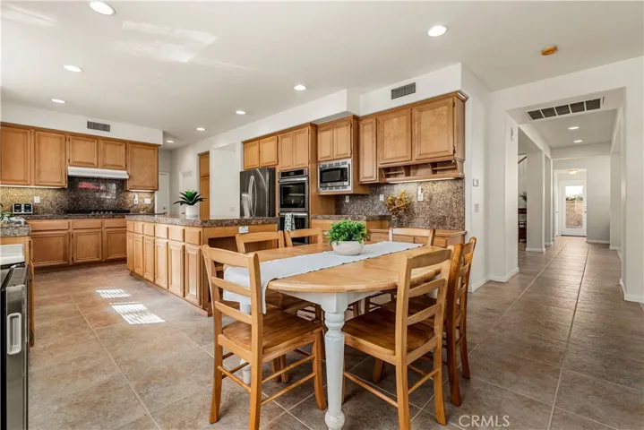 VERY FUNCTIONAL AND SPACIOUS KITCHEN WITH BREAKFAST NOOK AND MASSIVE ISLAND!