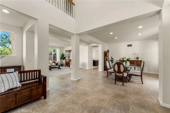 FORMAL ENTRY WAY WITH 2-STORY CEILINGS AND INCREDIBLE NATURAL LIGHT. BRAND NEW PAINT THROUGHOUT.