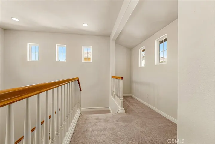 BRAND NEW CUSTOM PAINT AND UPSTAIRS COZY CARPET. Model showed a bookcase in this area or reading corner.