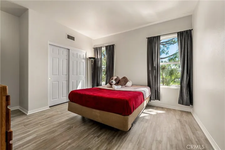 ONE OF THE 4 SECONDARY BEDROOMS UPSTAIRS (HOME HAS 4 BEDROOMS UPSTAIRS AND 1 DOWNSTAIRS)