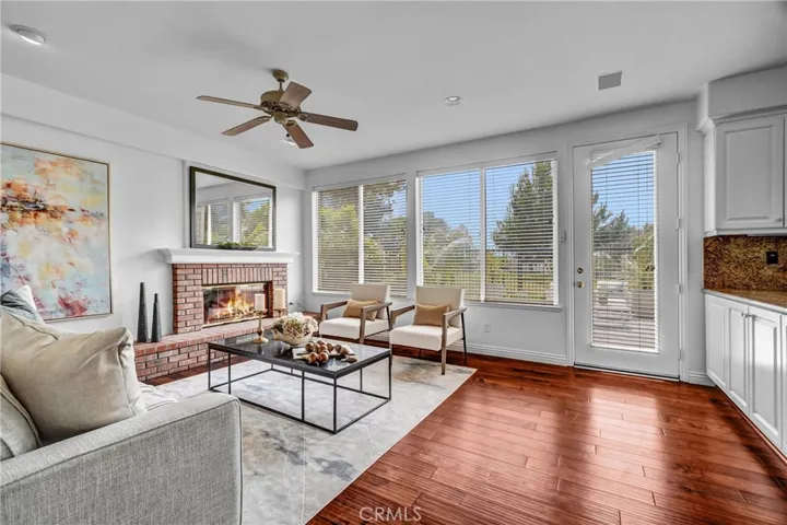 Family room with fireplace opened to the kitchen