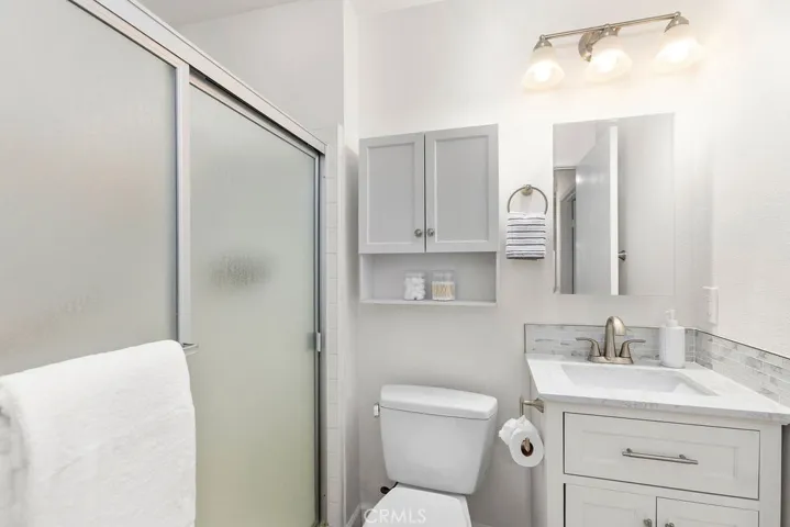 Secondary Bath with walk in shower.