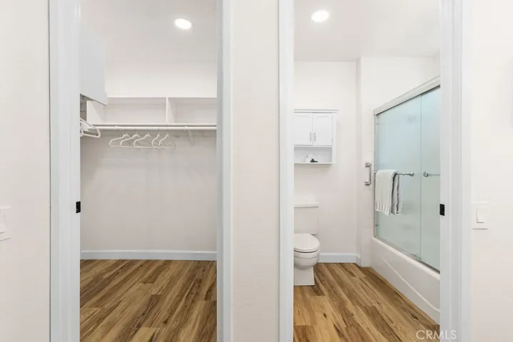 Walk in closet in Primary bedroom.