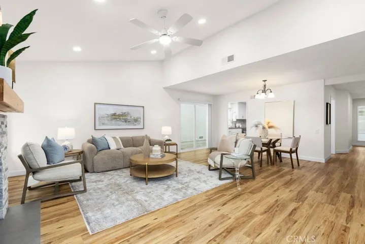 Vaulted ceilings with recessed lights.