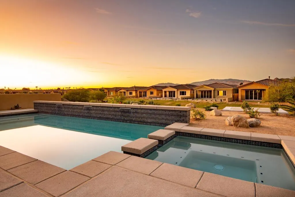 1. Back yard pool with sunrise view