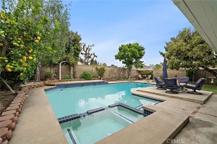 A true private resort featuring a sparkling pool, spa, water features