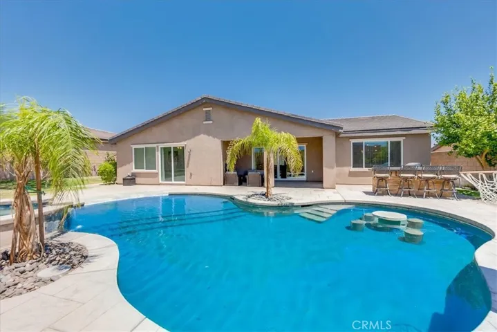 Heated salt water pool with pool chiller