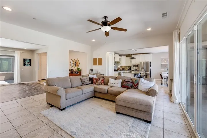 Great room with ceiling fan