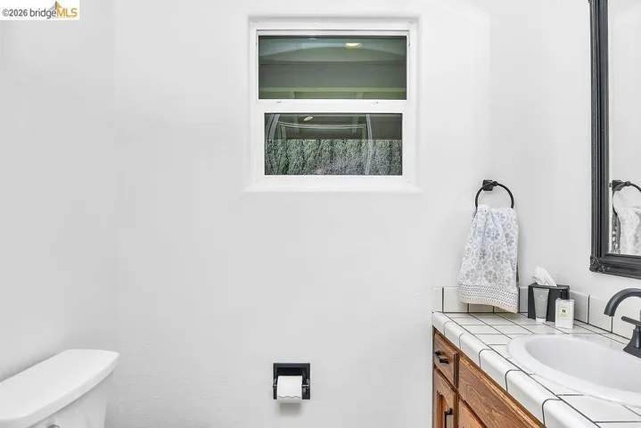 Bathroom with vanity and toilet