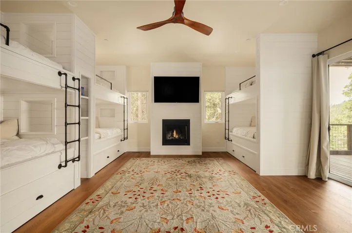 Bunk room with fireplace