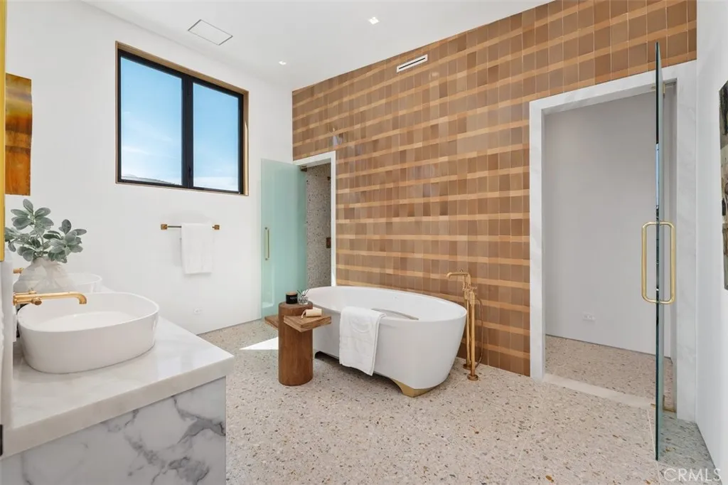 En-suite with hand made, custom Italian tile, Italian marble & brass fixtures