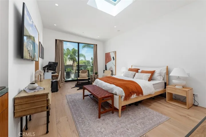 Second level first primary suite with skylight &