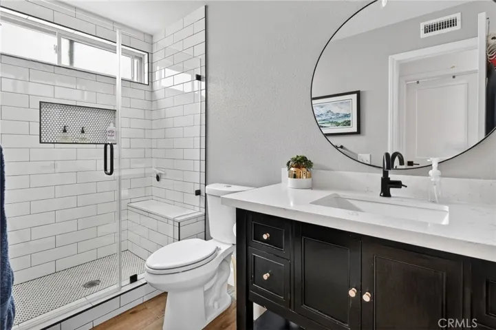 Downstairs Remodeled bathroom with walk in shower