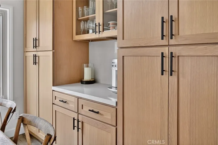 The dining area has a custom built in cabinet