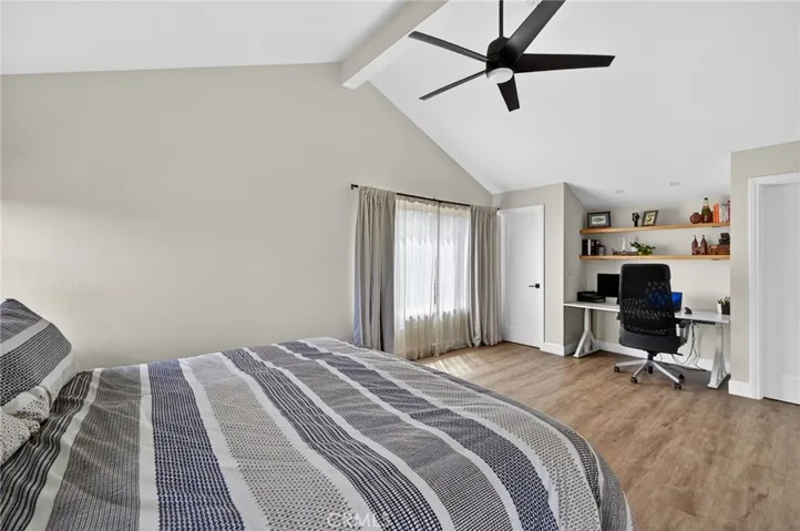 Primary Bedroom has 2 Walk in Closets and a desk insert with lighting and shelves