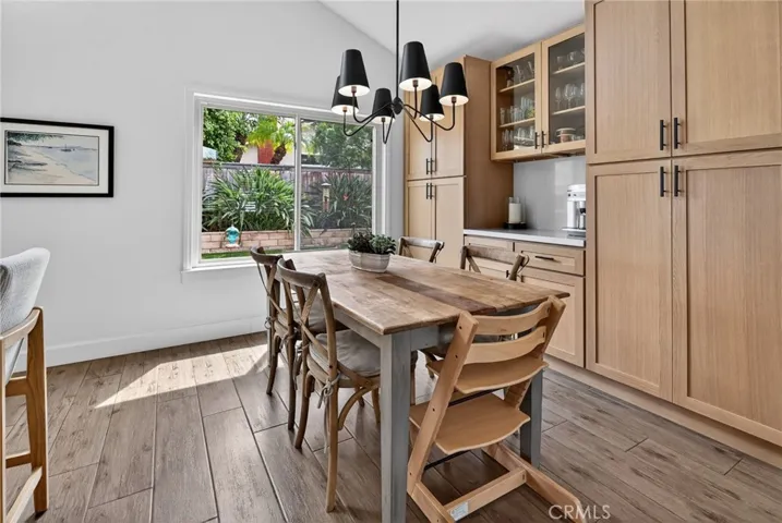 The dining area has a custom built in cabinet