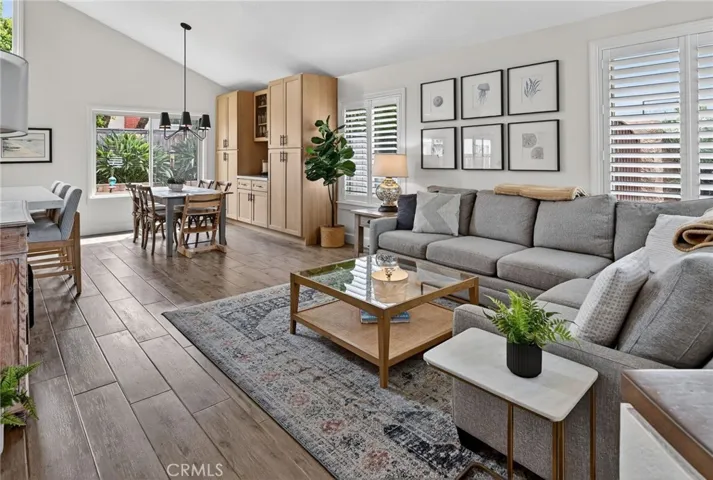 Neutral colors in living room.  Tile flooring