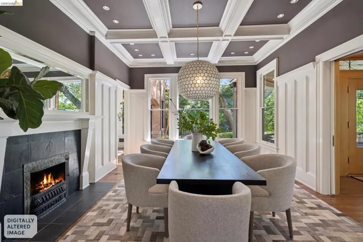 Dining room featuring coffered ceiling, a fireplace, recessed lighting, and ornamental molding