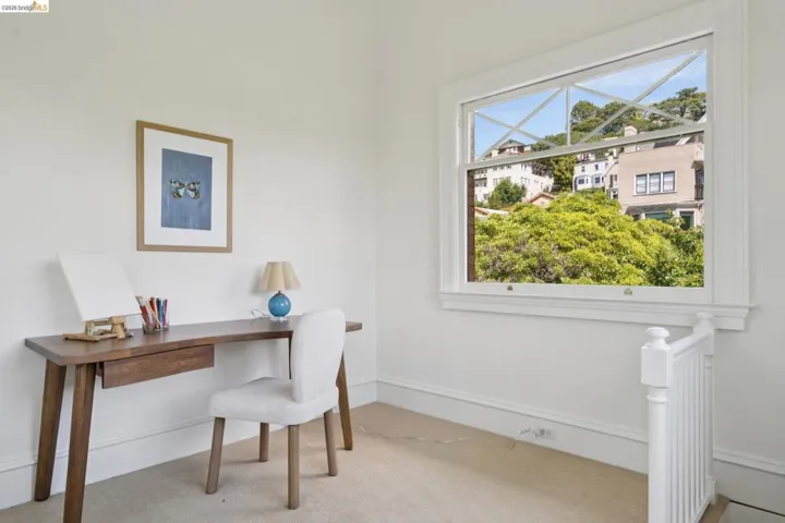 Office space featuring light colored carpet