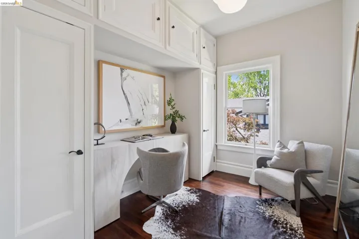 Office space featuring dark wood finished floors